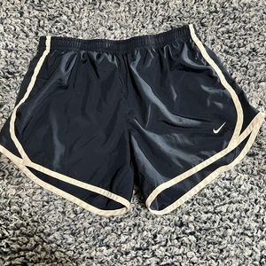 Navy blue and white athletic shorts
